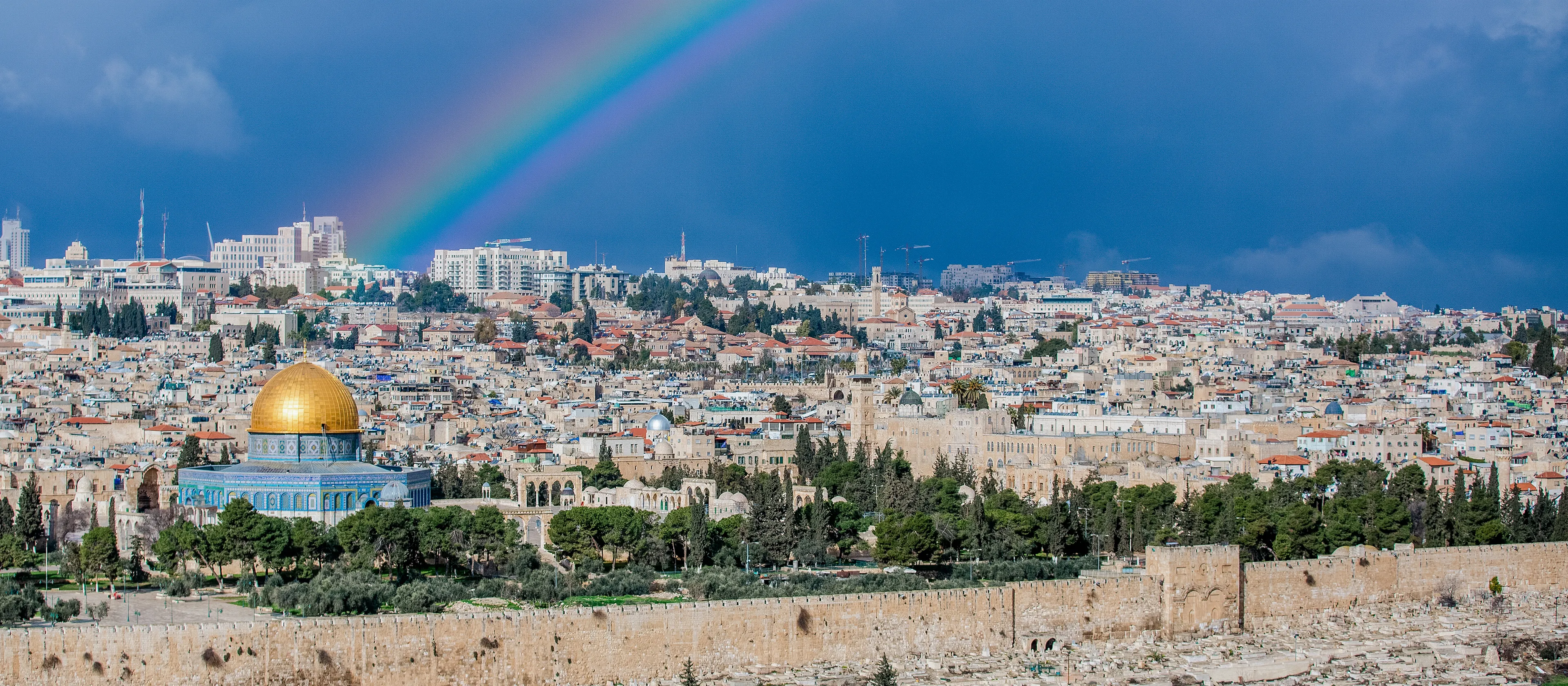 A rainbow in the sky above the Dome of the Rock and the city of Jerusalem