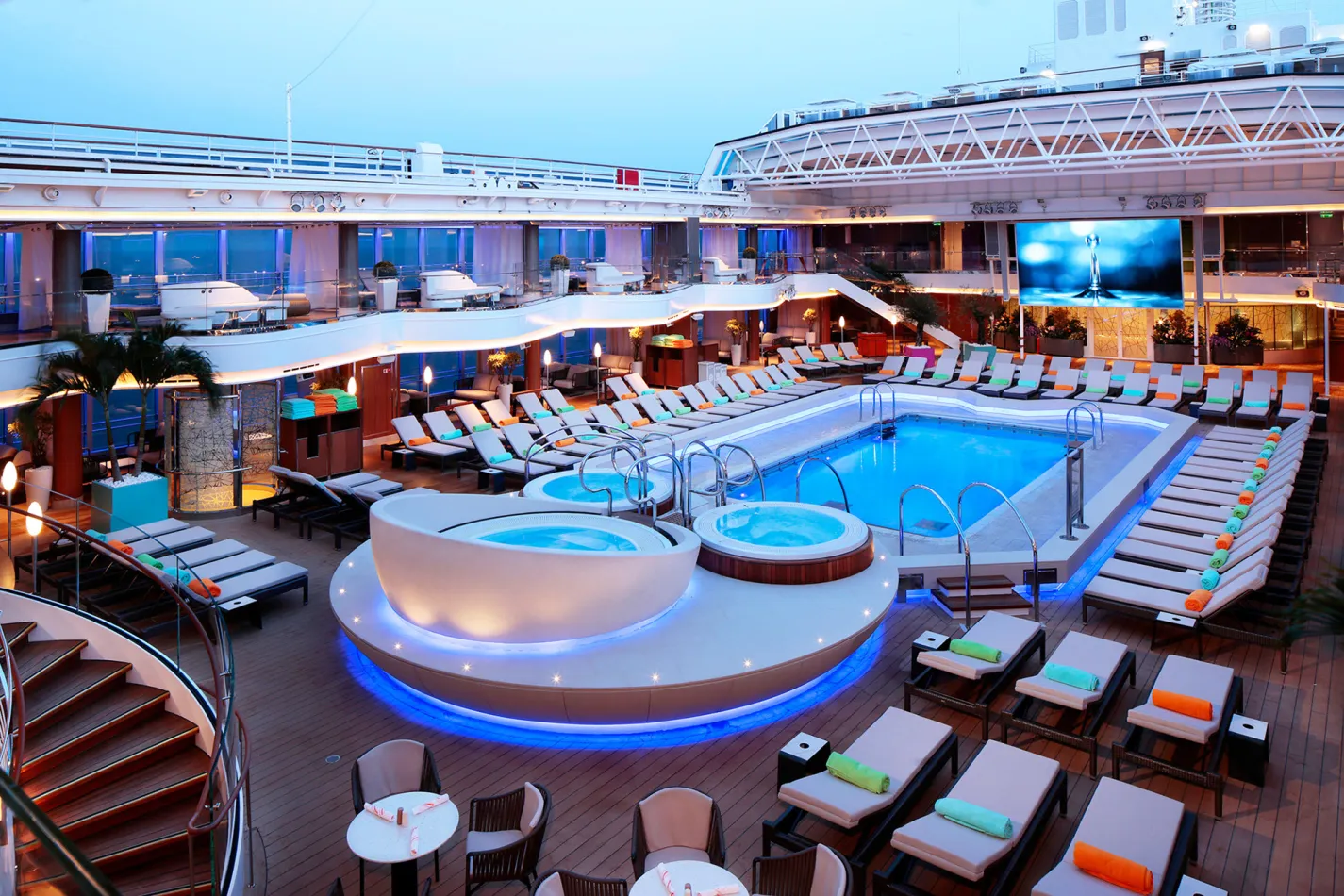 Outdoor pool and seating on a cruise ship